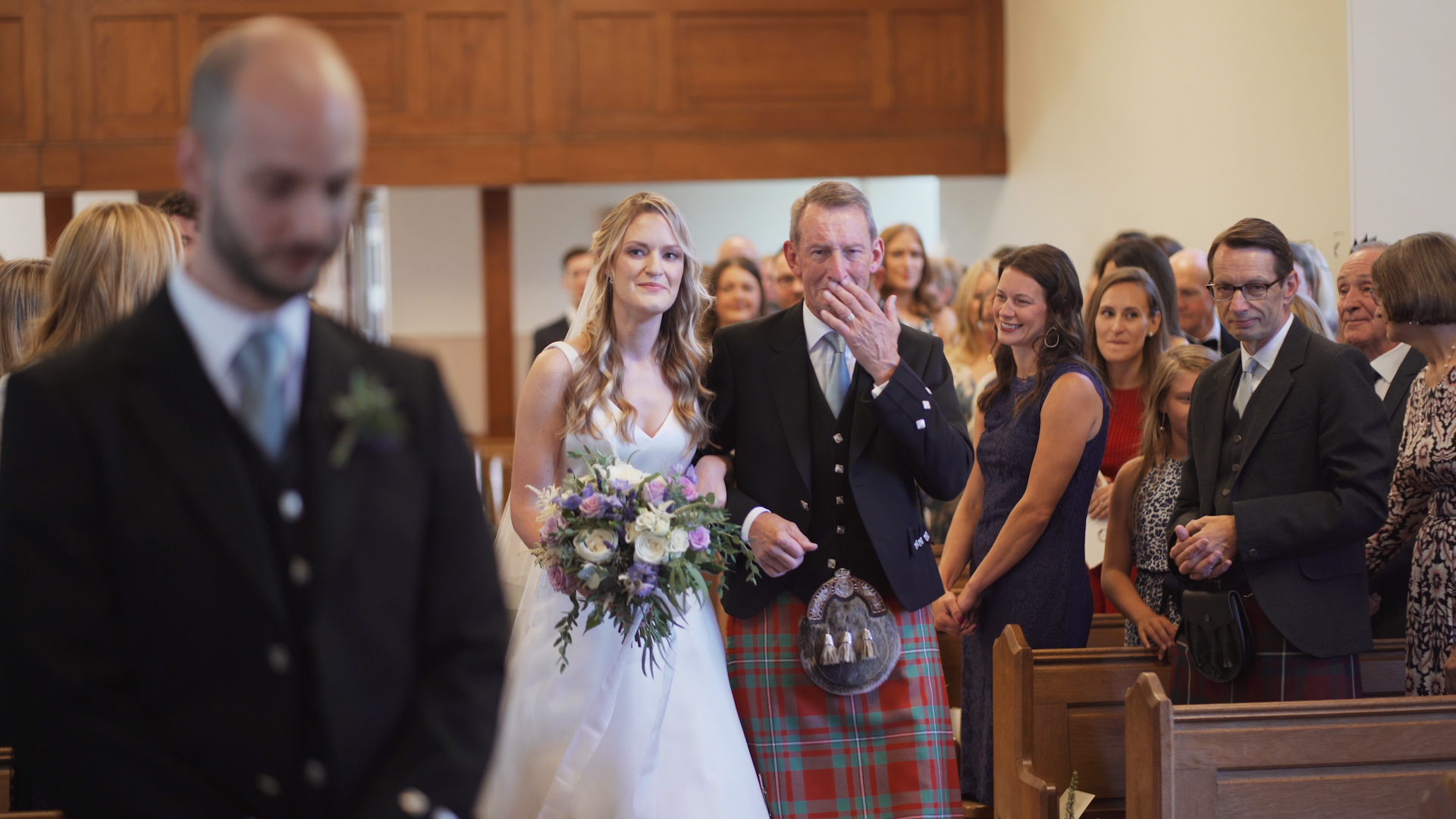 emotional father walks daughter down the aisle at her wedding